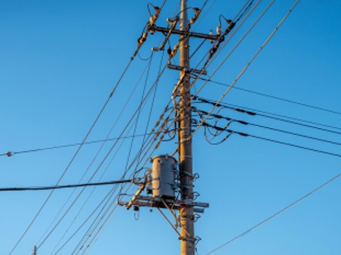 power lines against blue sky
