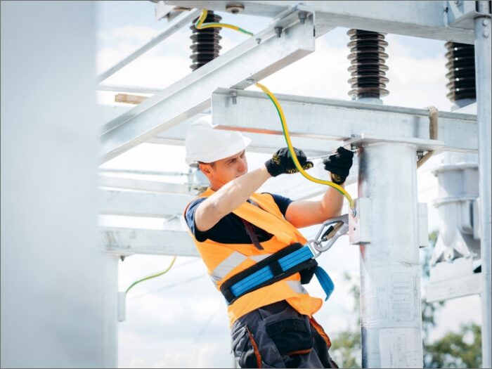 power worker on electric lines